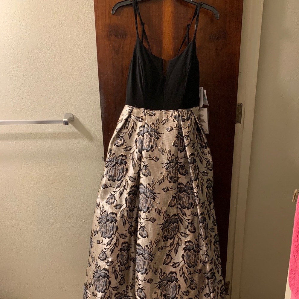 Black and gold ball gown dress